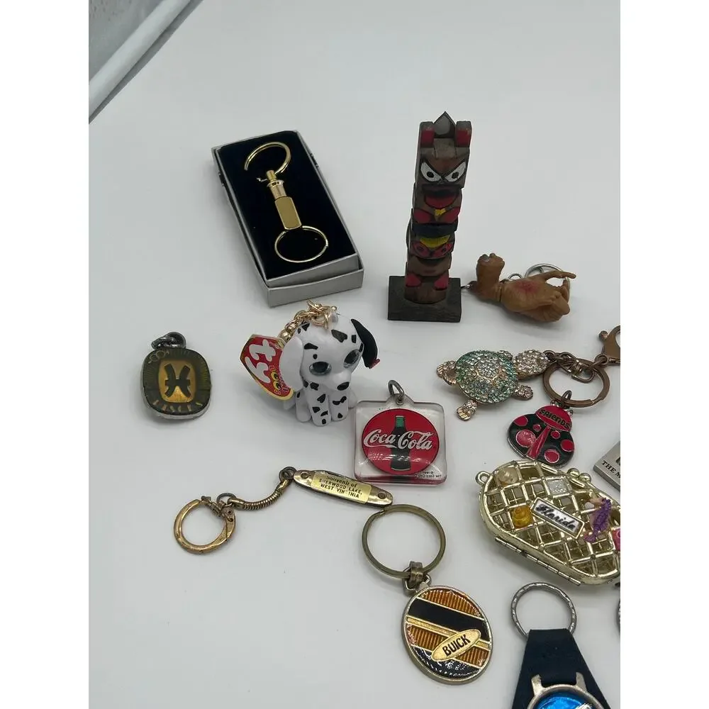 Vintage Keychain Figurine Mixed Lot of 21 ET Tiki Scuba Helmet Buick Coca Cola
